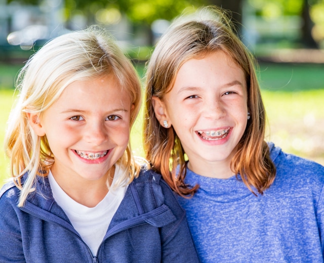 Friends with braces Dr. W. Gray Grieve Orthodontics in Eugene, OR